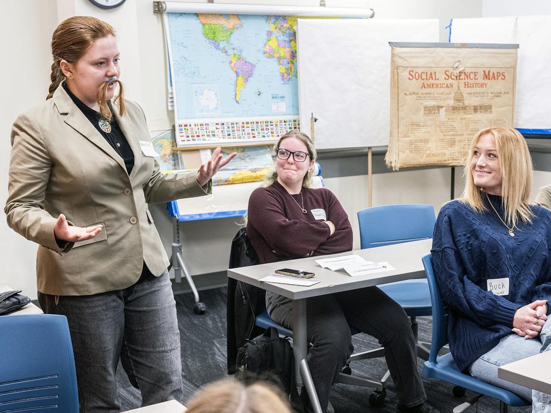 A student is giving a history class presentation