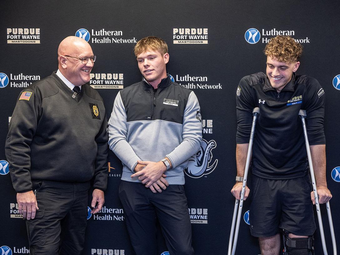 Fort Wayne Fire Department Chief Eric Lahey, PFW golfers Landon Smith and A.J. Agnew