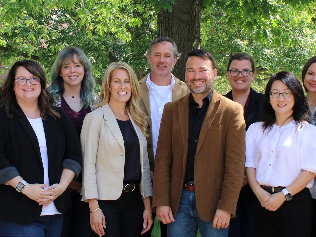 CELT staff standing outside