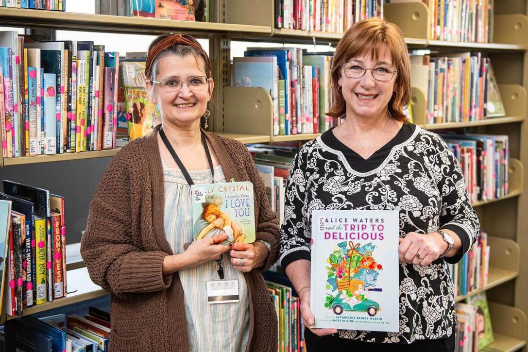 Faculty members show off their Book Bundles Project funded by SoTL.