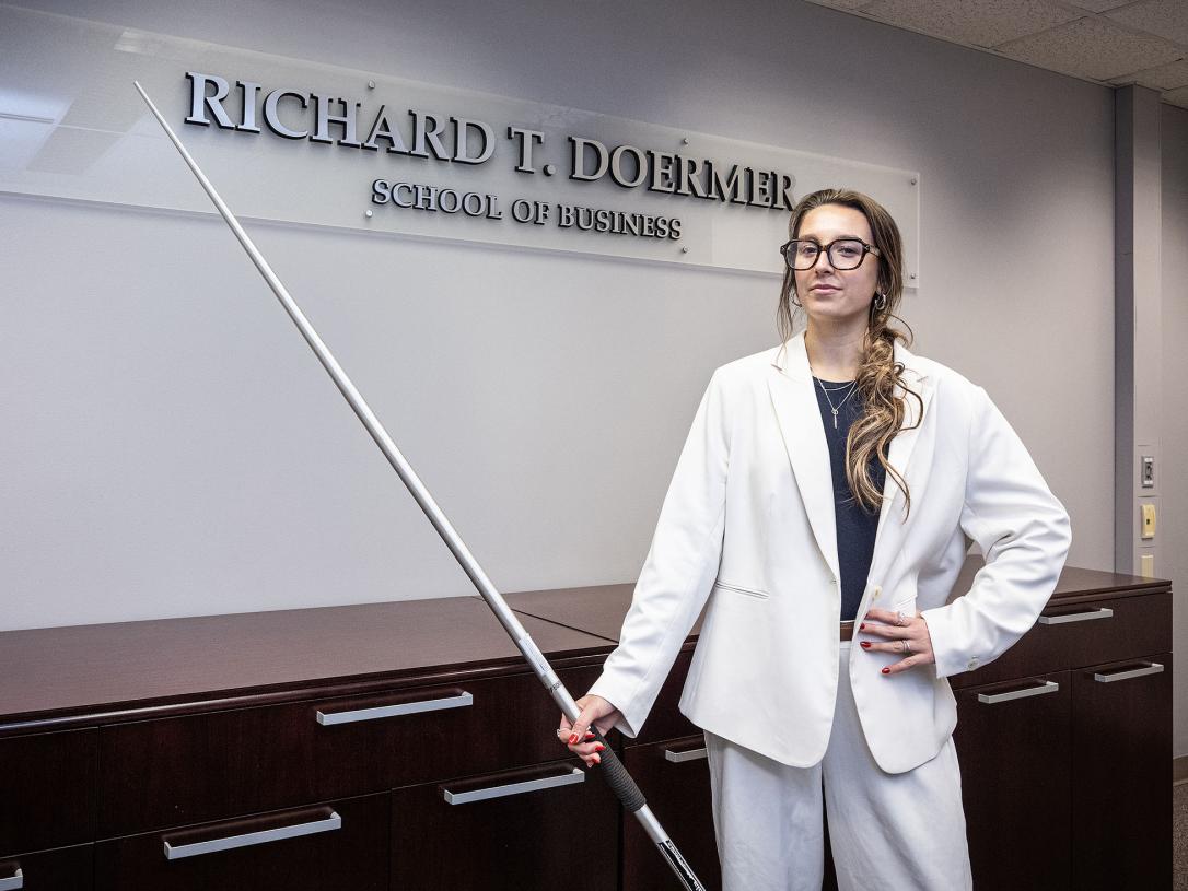 Emilia Russell is holding a javelin