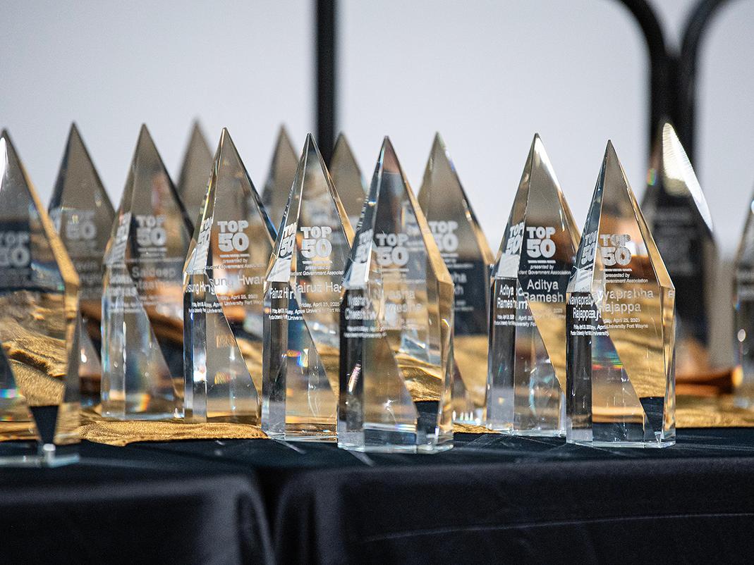 Several Top 50 awards are on a table