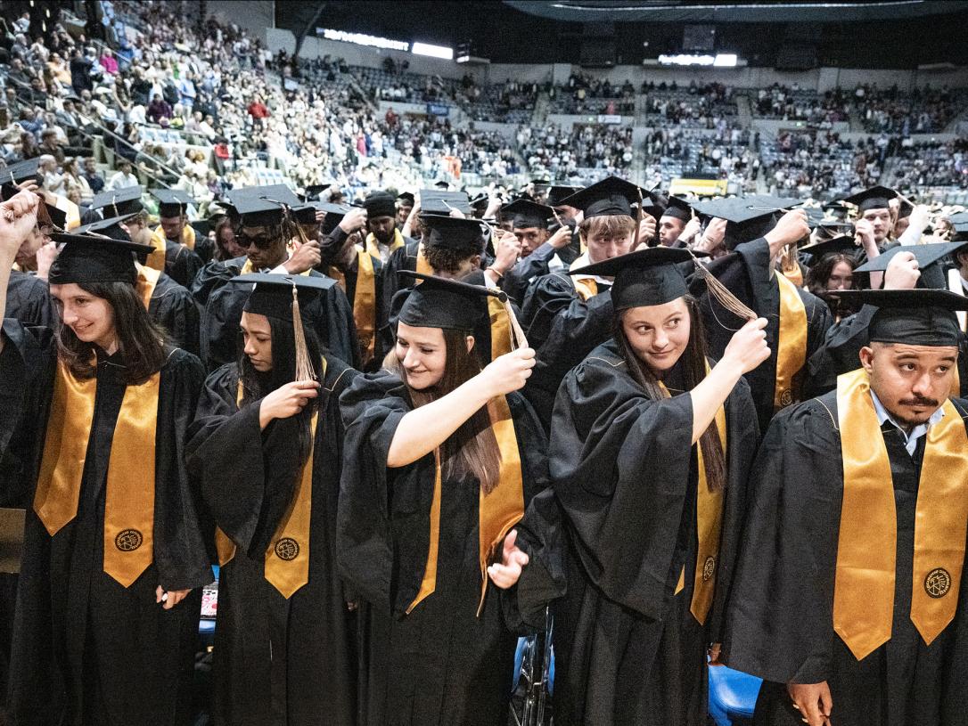 Students move their tassles during the 2026 PFW commencement ceremony