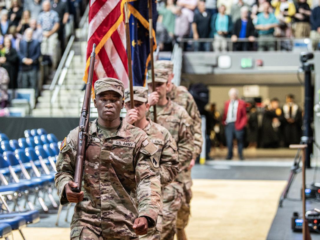 Flags being walked into the 2026 commencement ceremony