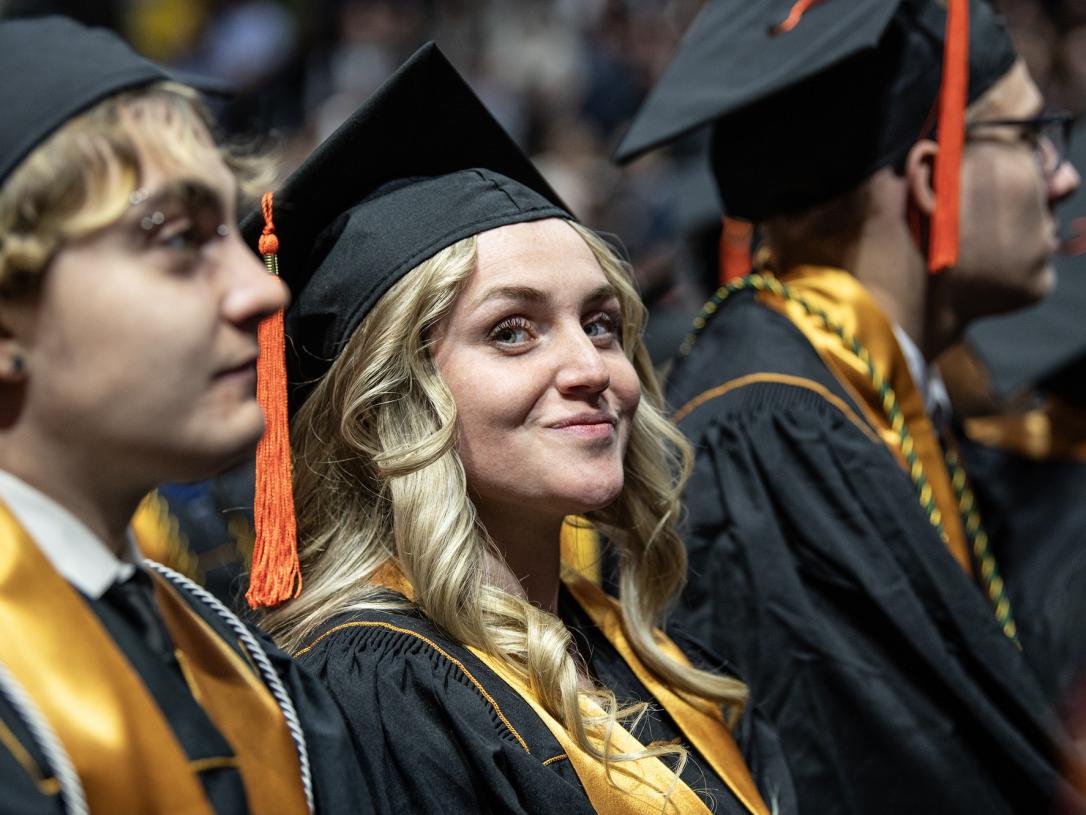 A student catches the camera at the 2026 commencement ceremony