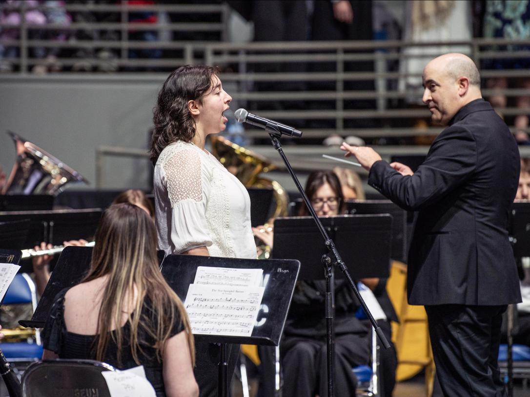 A performer sings at the 2026 commencement ceremony