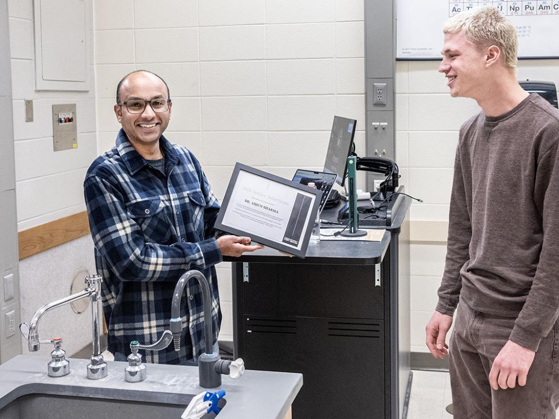 A person is being awarded a certificate