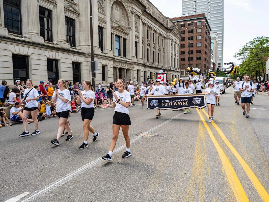 Participants in a 4th of July parade