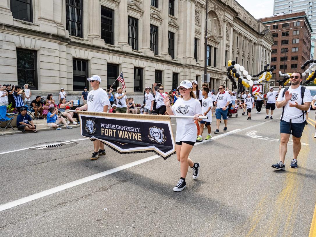 Participants in a 4th of July parade
