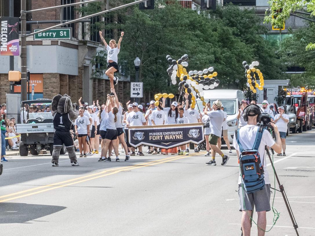 Participants in a 4th of July parade