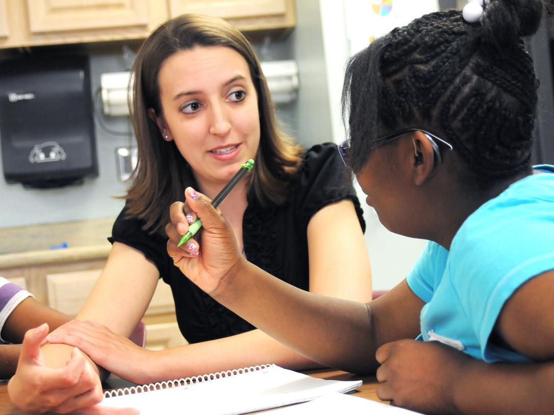 Female student teacher and student