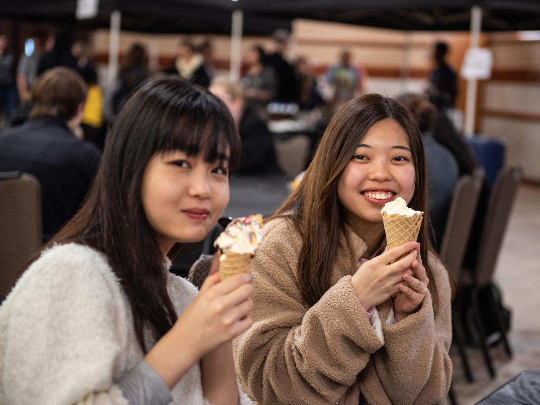 Students enjoying ice cream together.