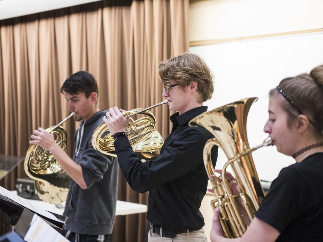 Students rehearsing together.