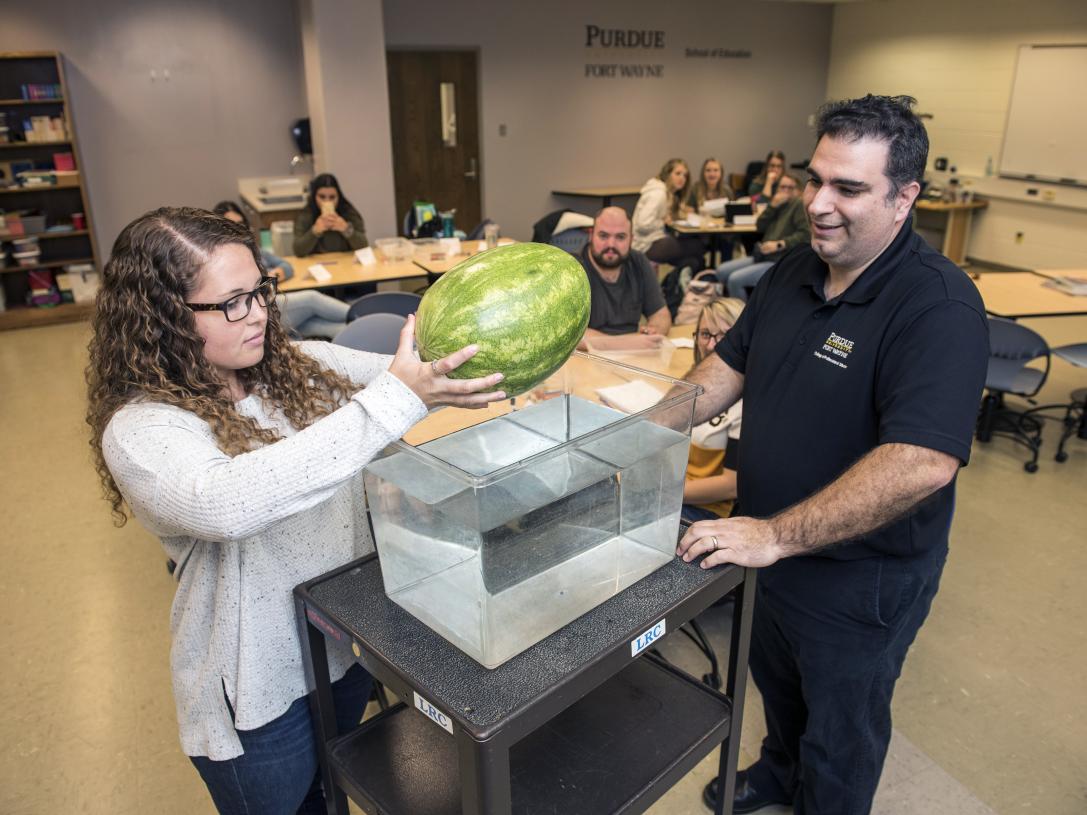 Student teachers carry out an experiment