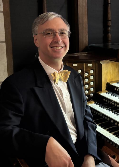 Andrew Peters, man in glasses and a bowtie