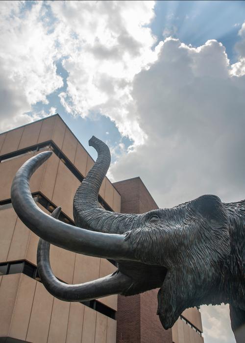 Mastodon statue with clouds I