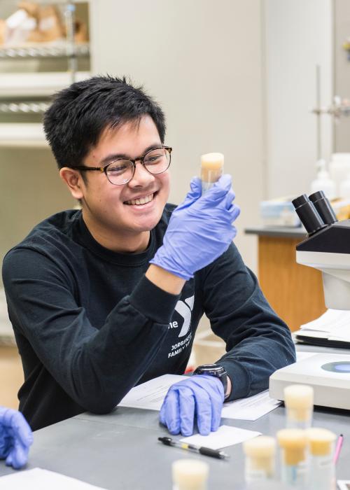 PFW student in a science lab.