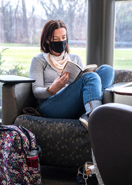 Student reading a book