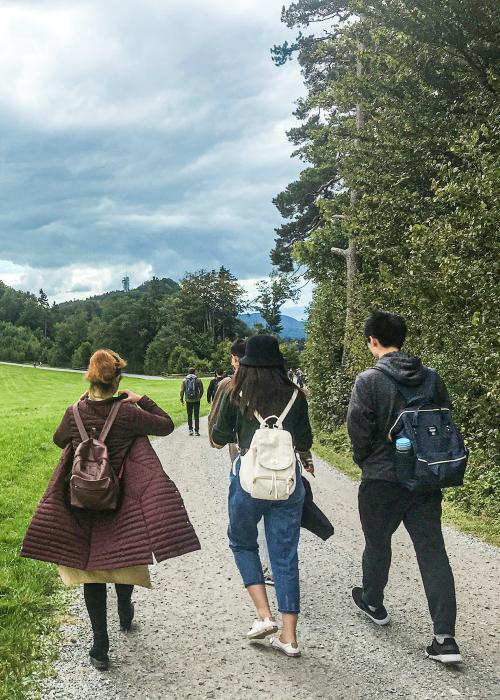 Students on a study abroad trip taking a walk.