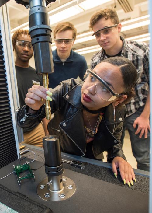 Students using equipment