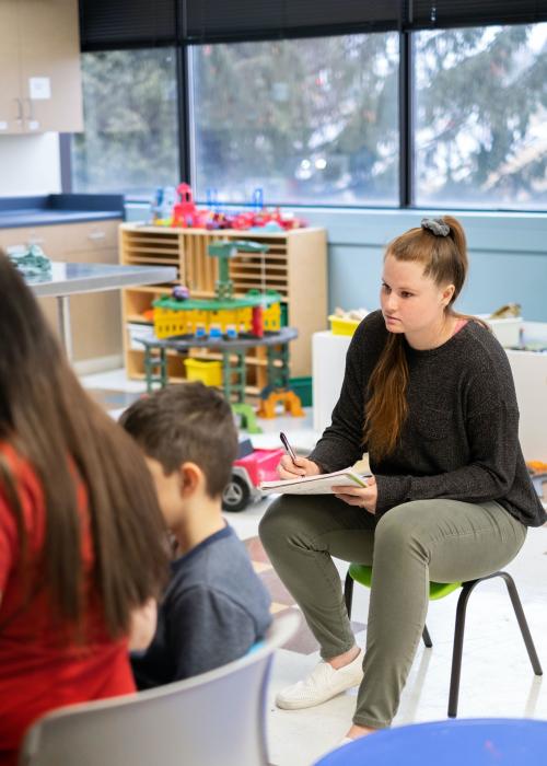 Psych student interns at Child's Play.