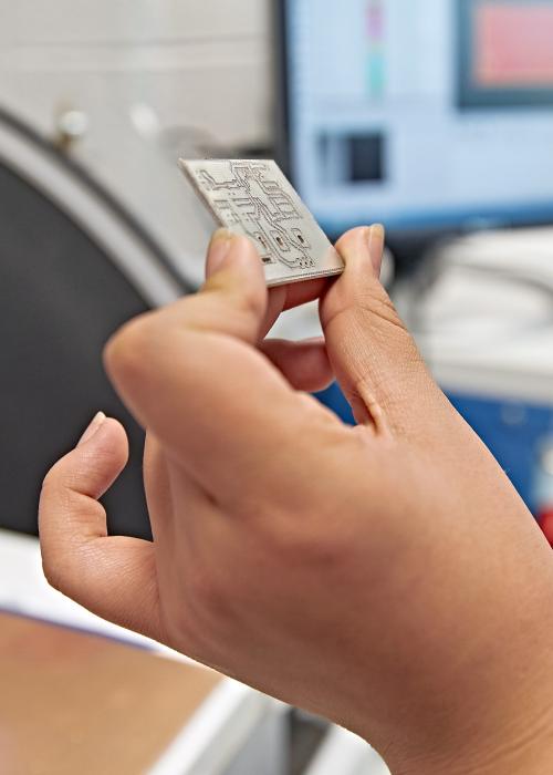 Hand holding a circuitboard