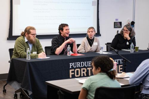 Students on a panel for the Department of History.