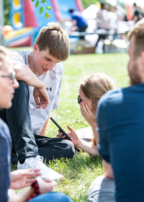 Students check out an email from Don Life.