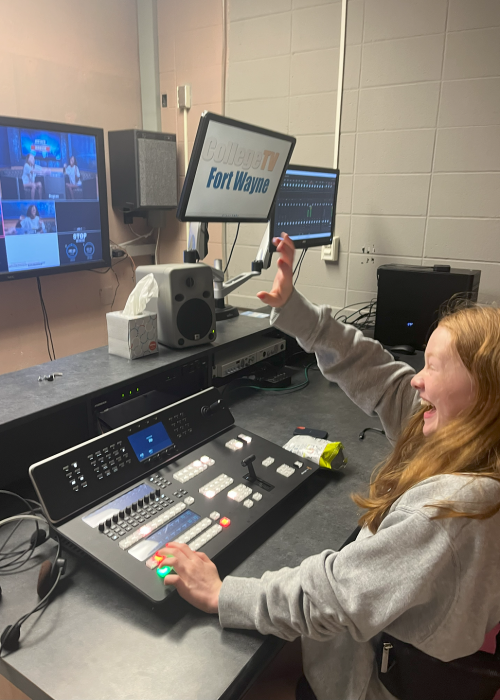 Student sits behind switcher and directs the cameras
