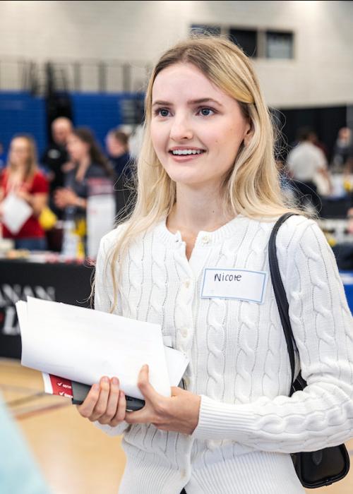 Student at the DSB career fair on campus.