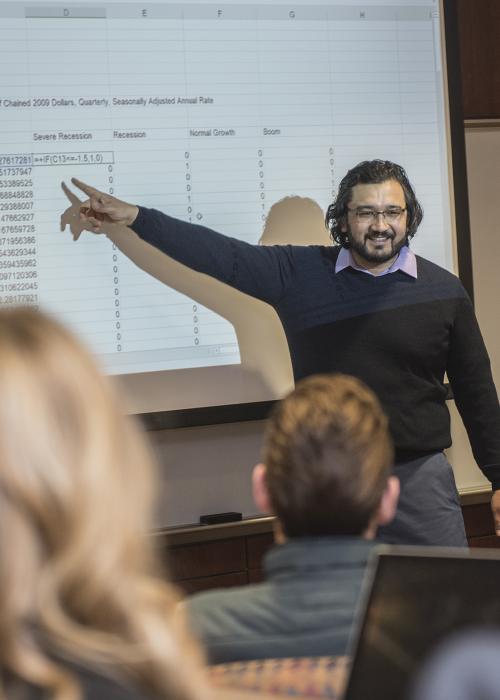 Dr. Nazarov teaching students in classroom