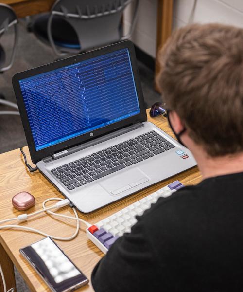 Student with computer