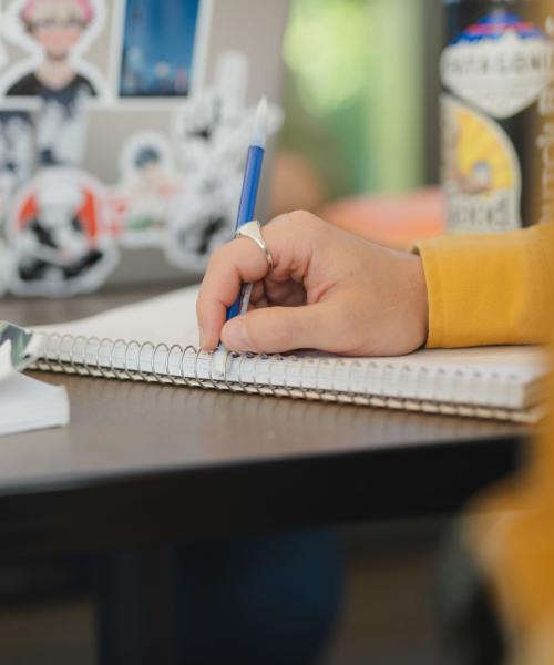 Close up photo of note taking.