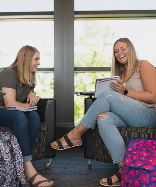Female students studying together.
