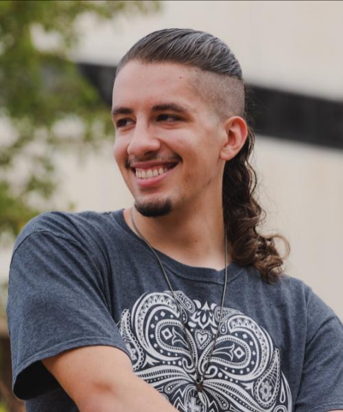 A student smiles for a picture.