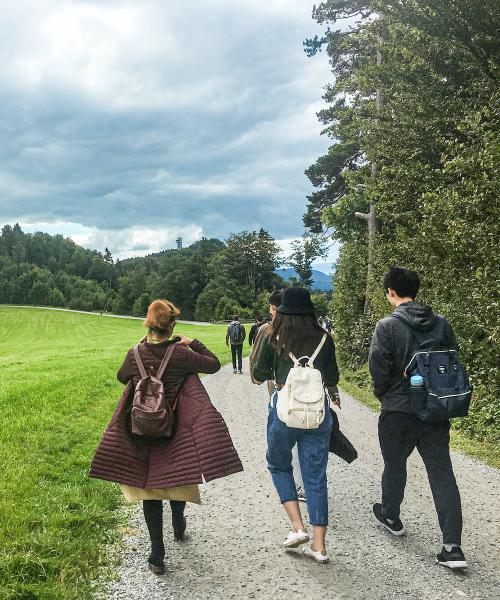Students on a study abroad trip taking a walk.