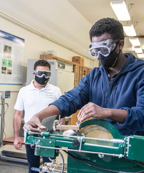 Student using equipment