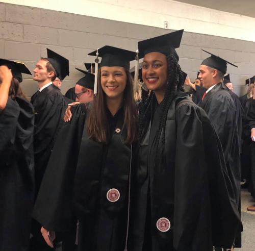 two women's studies graduates