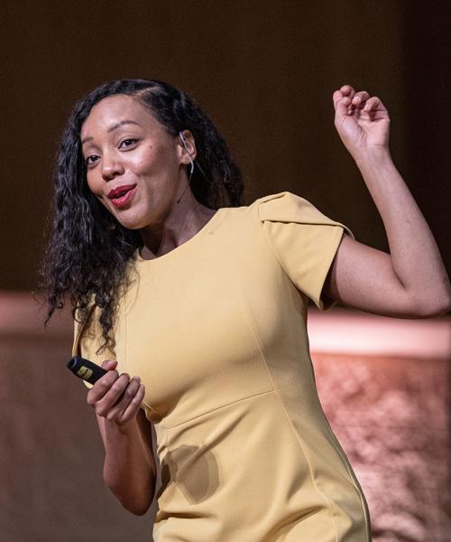 Omnibus speaker Moogega Cooper speaks to the audience in Auer Performance Hall