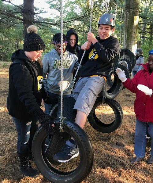 Students on ropes course