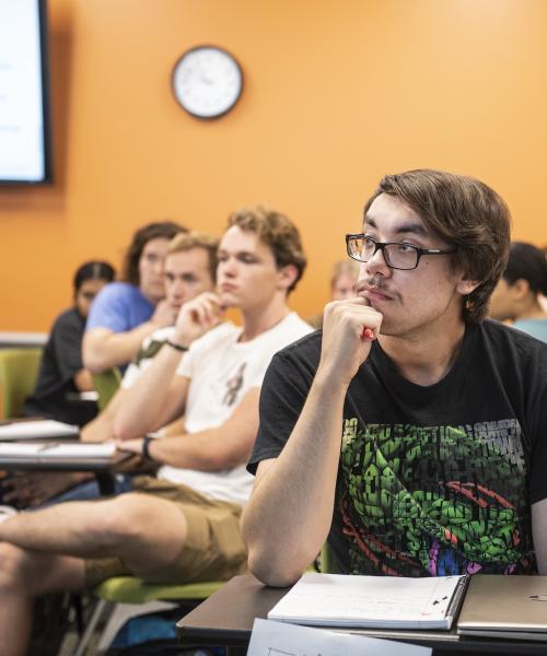 COLA students listen to a lecture.