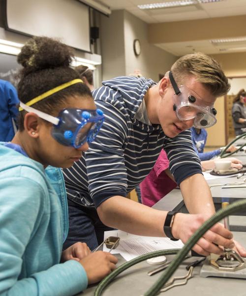 Chemistry lab with students doing experiments.