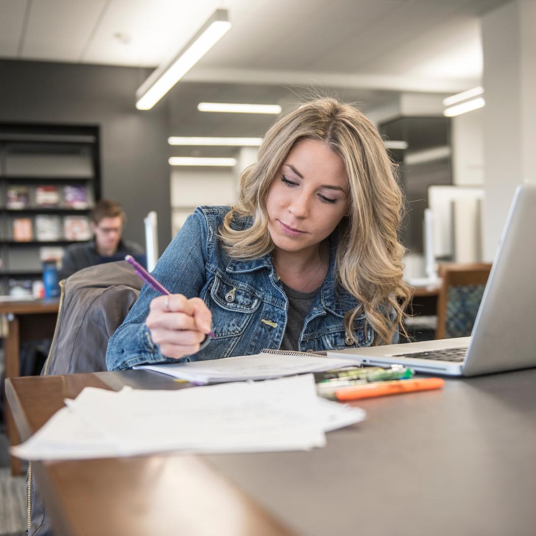 Student studying in the library.