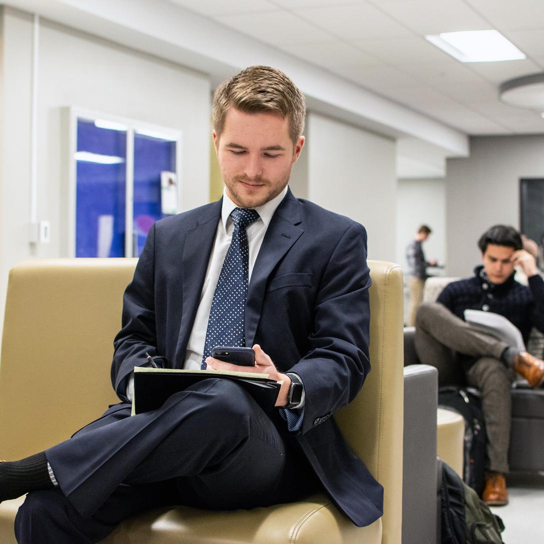 Male student sitting in Kettler
