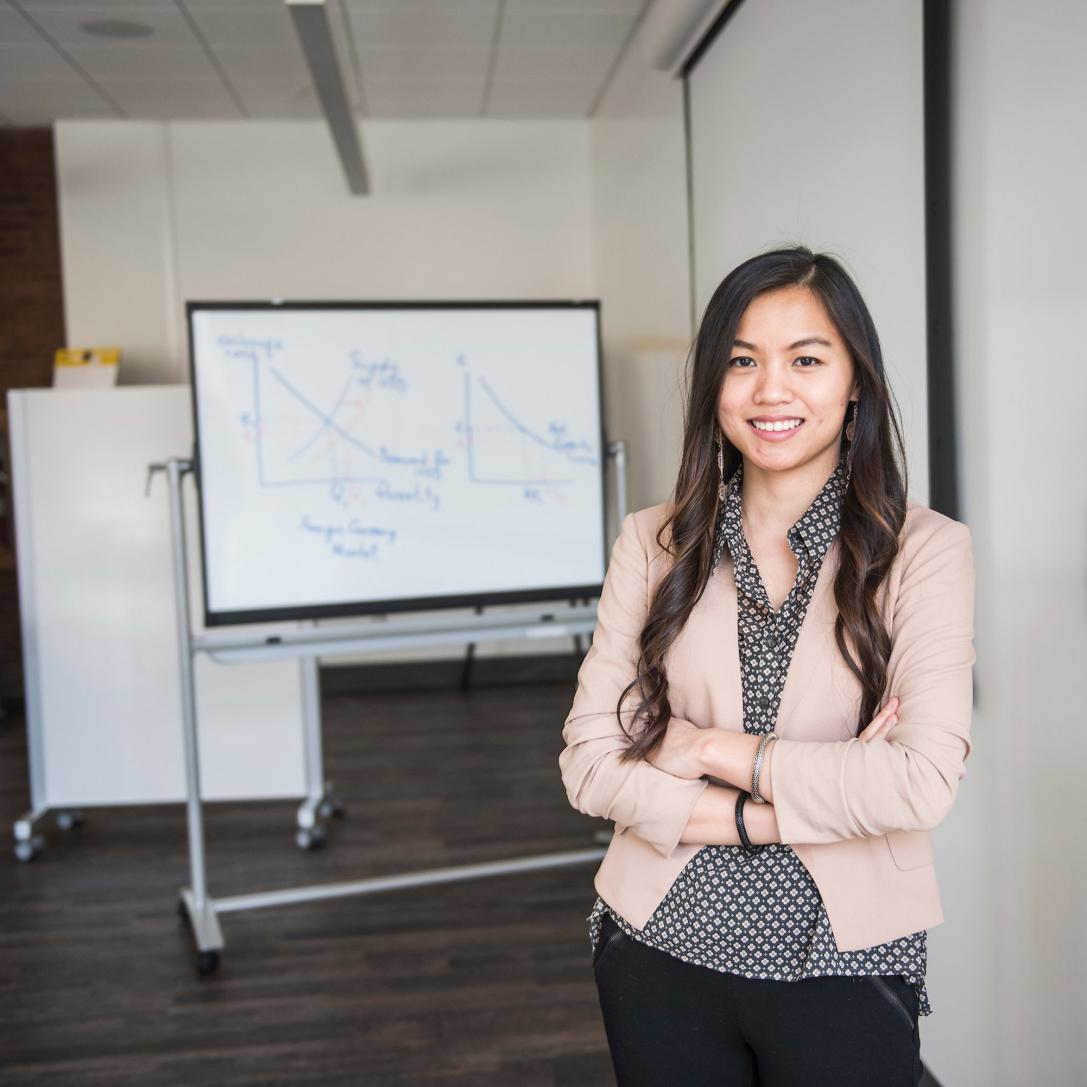 Female business student posing indoors.