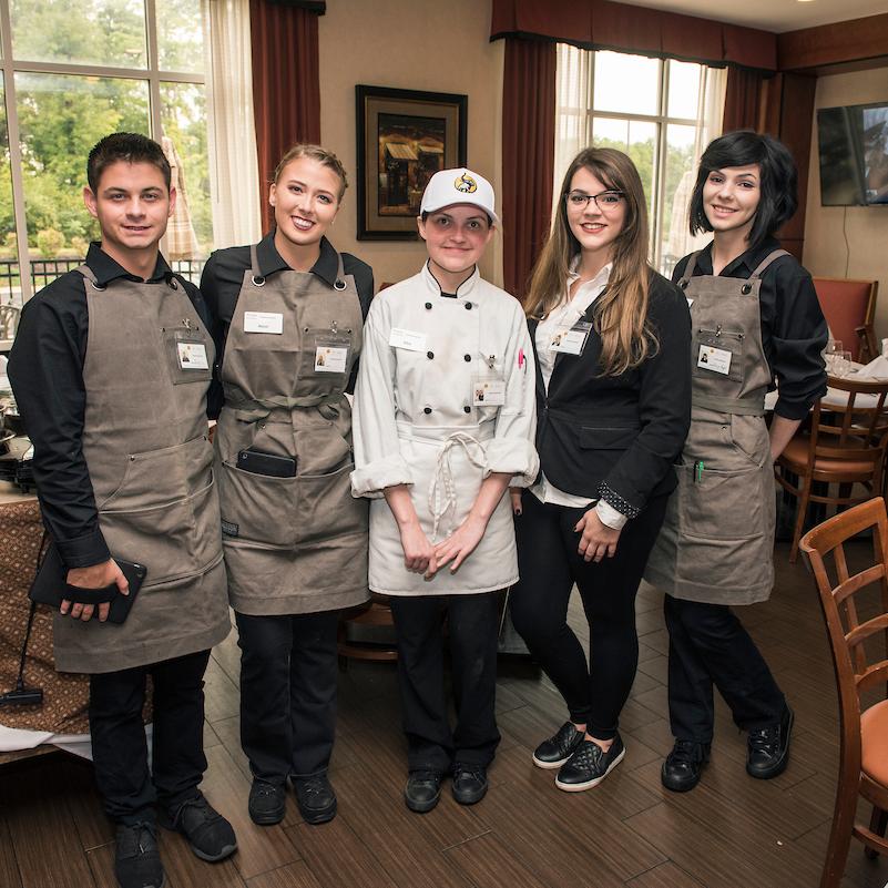 Students working at event