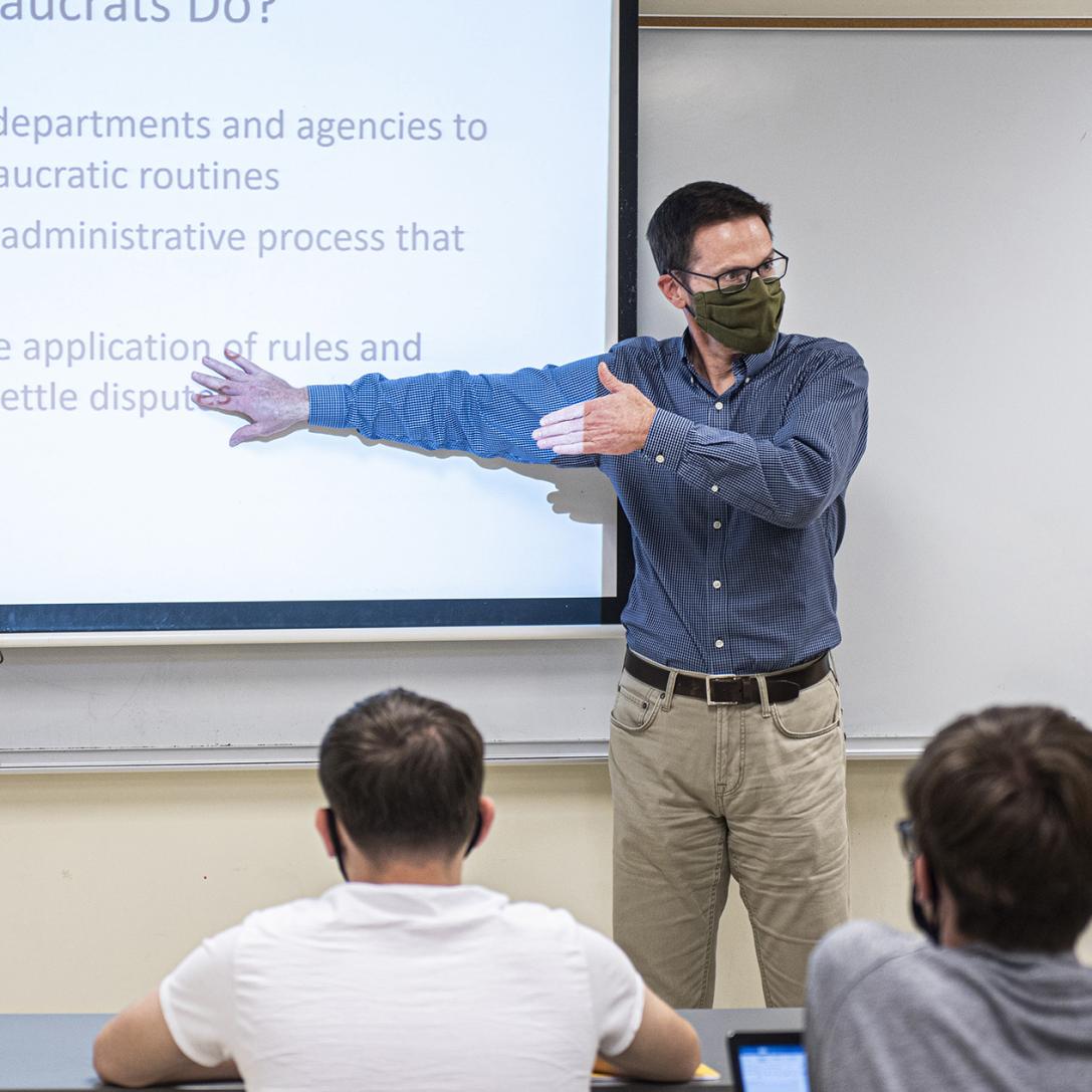 Political Science faculty Andy Downs instructs a class