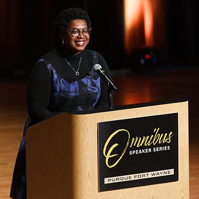 Omnibus speaker Ashley C. Ford speaks to the audiece in Auer Performance Hall