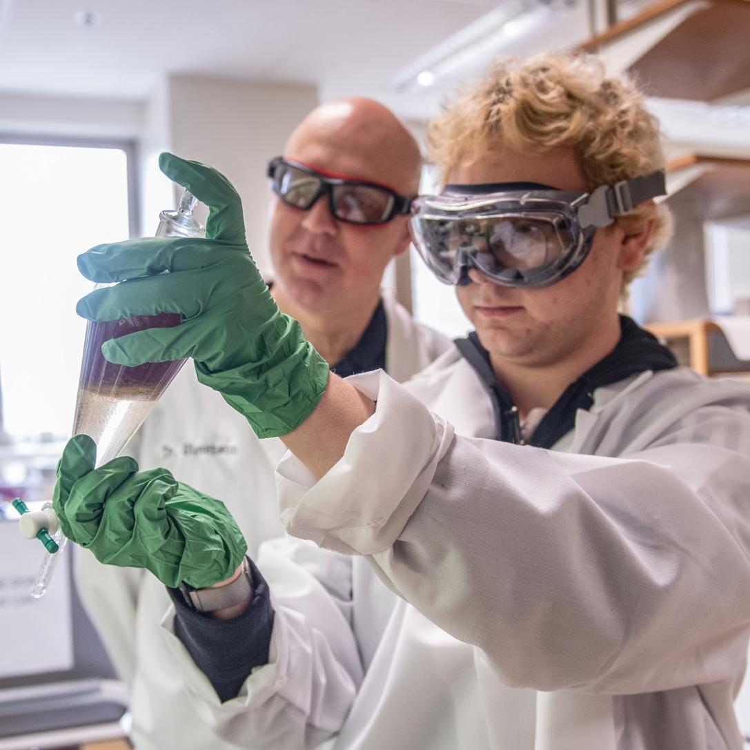 Professor Stevenson with a Chemistry student