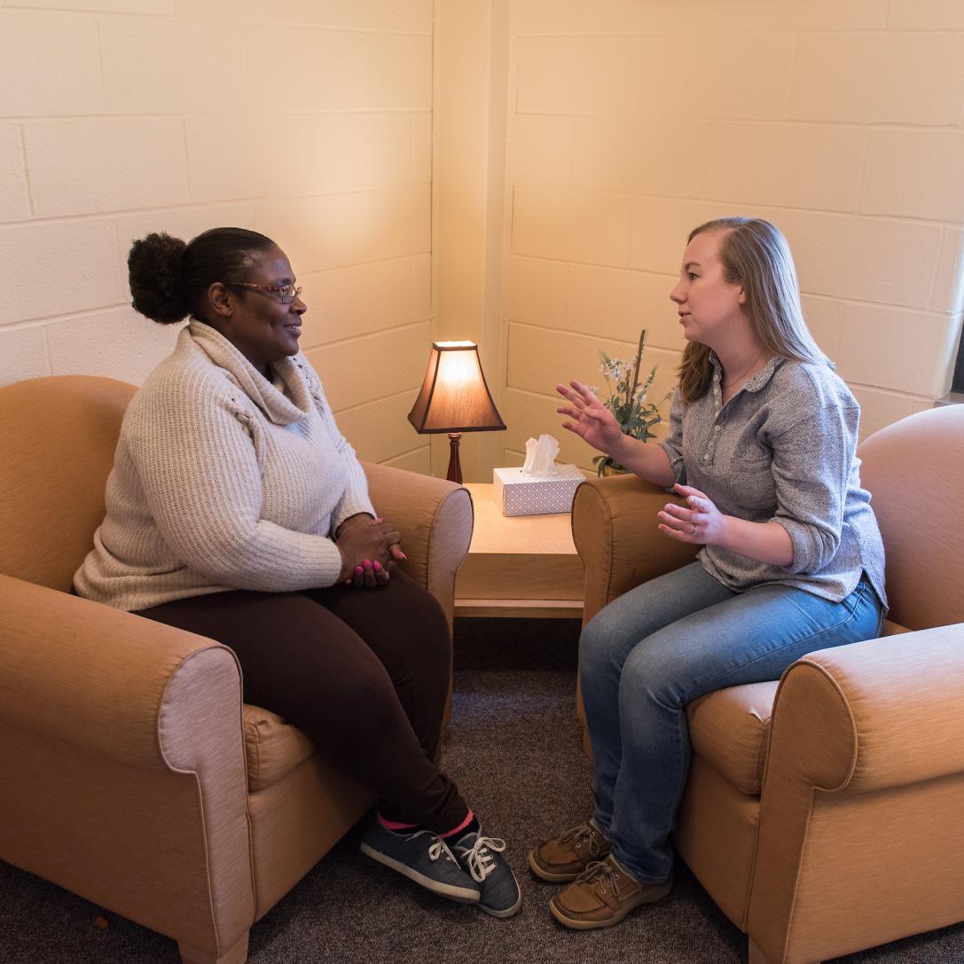A PFW counseling student works with a client in the counseling center.